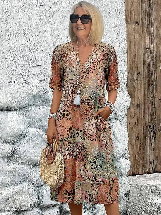 Dorina | Šaty s véčkovým výstřihem a potiskem