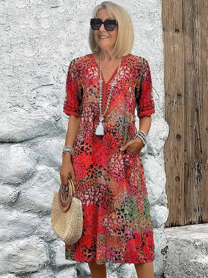 Dorina | Šaty s véčkovým výstřihem a potiskem